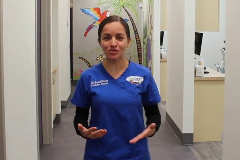 Dentist is smiling in a dental clinic