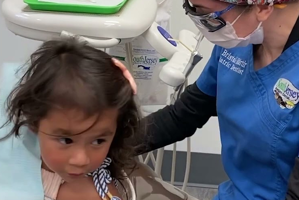 Dentist with a young patient